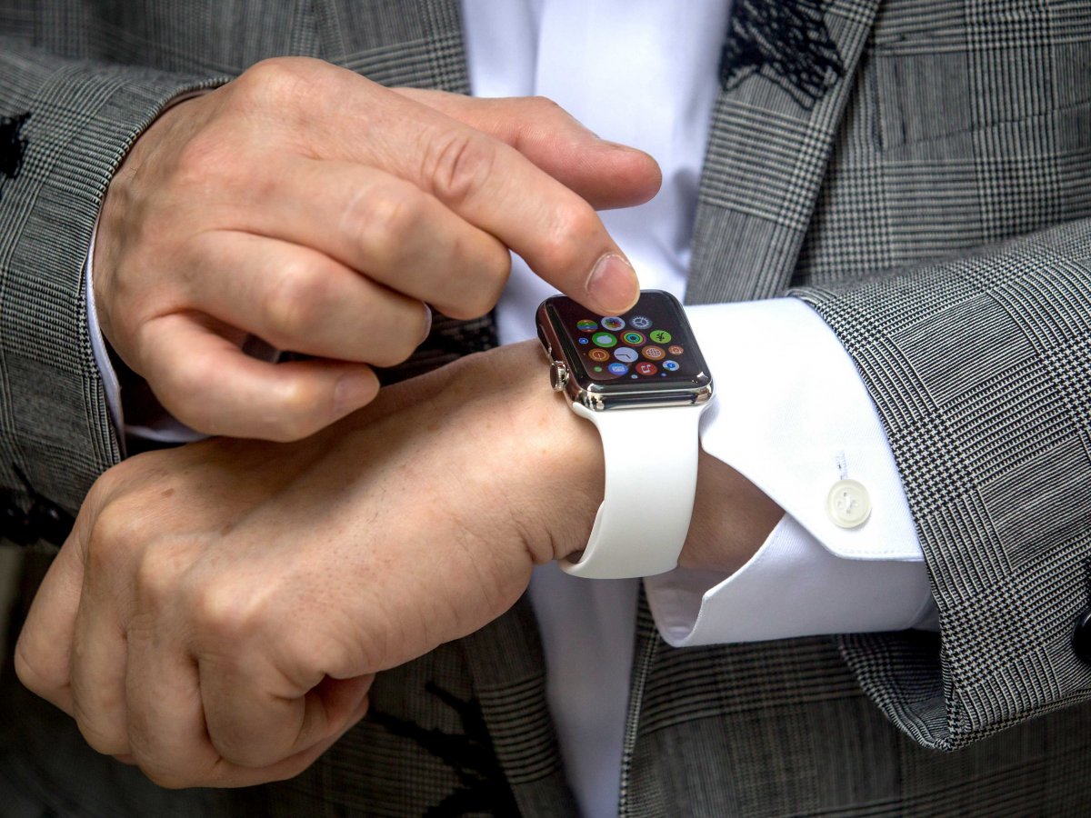Apple smartwatch with a grey suit