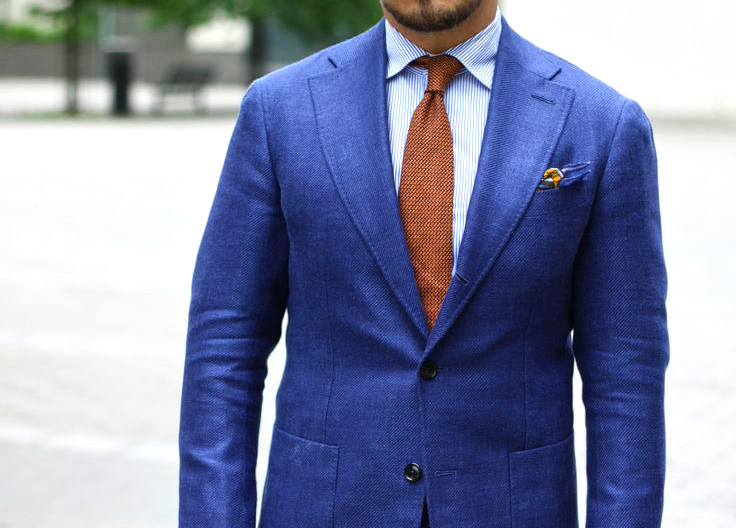 Complementary colors scheme: Navy suit dark orange tie color combination