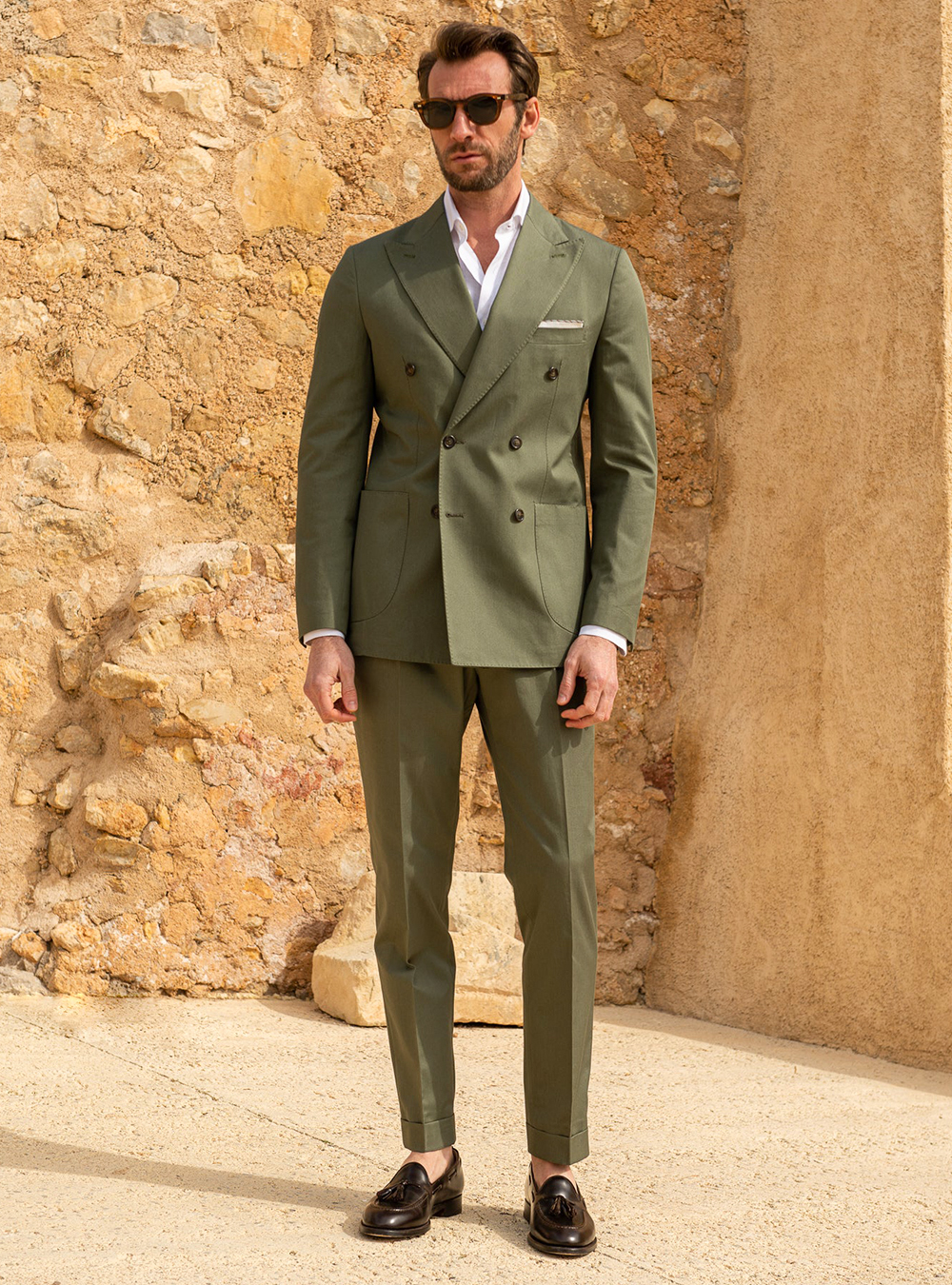 Green double-breasted suit, white dress shirt and brown loafers