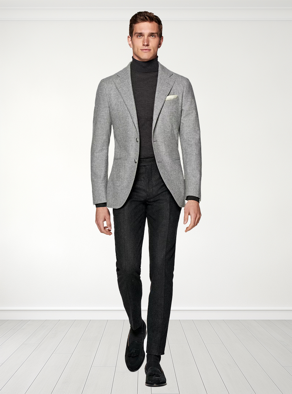 light grey blazer, charcoal turtleneck, and black pants