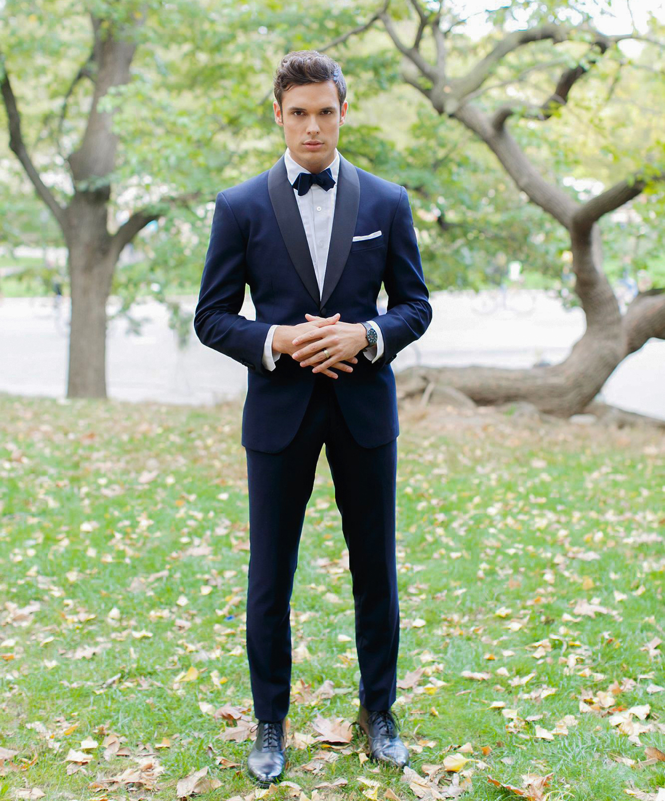 midnight blue wedding tuxedo with white pocket square