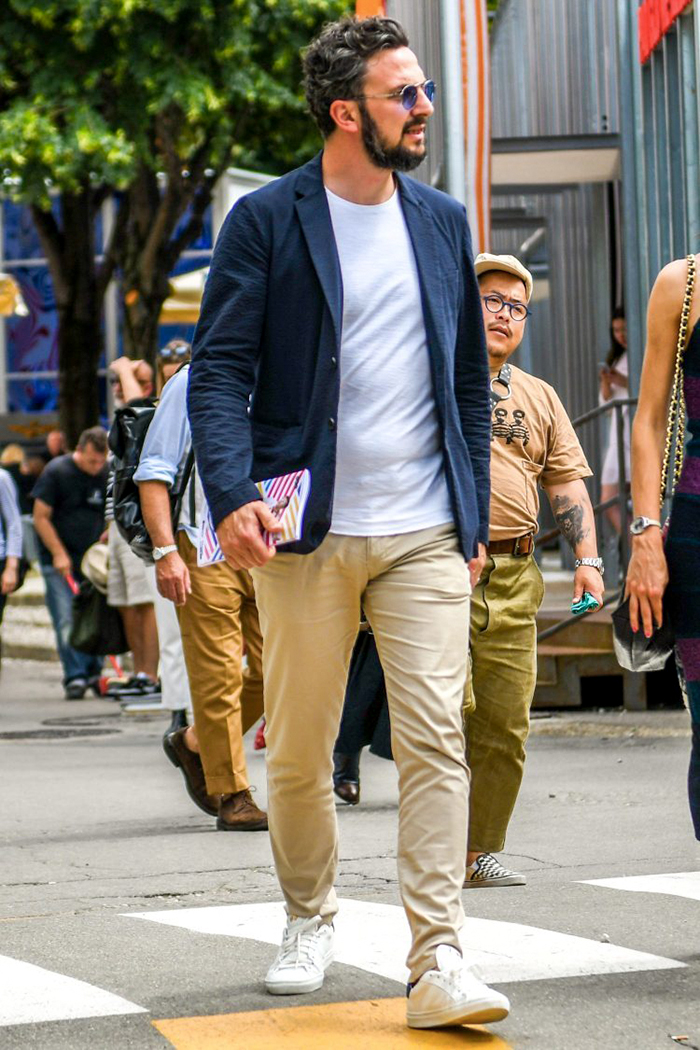 navy sport coat, white t-shirt, and white sneakers