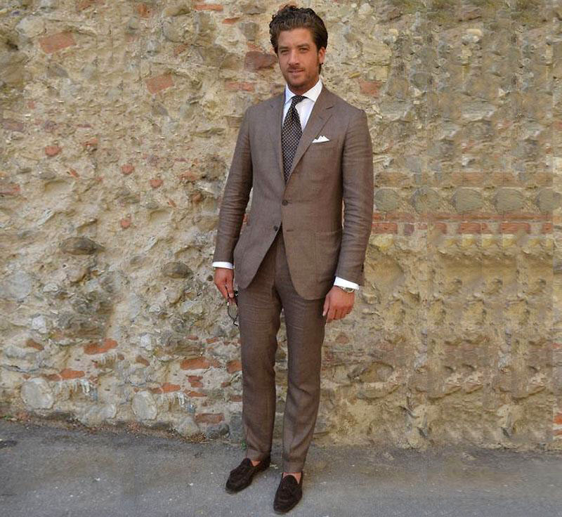 wearing brown linen suit